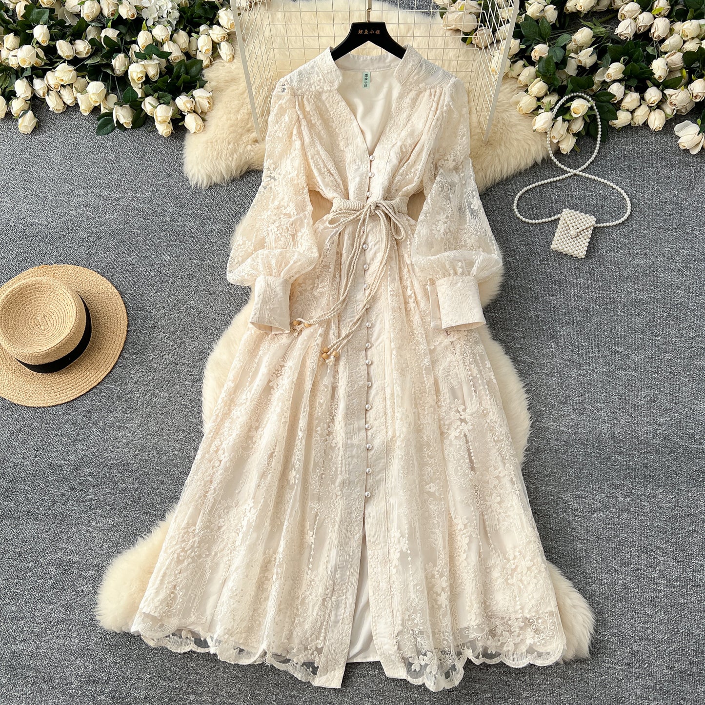 French high-end women's dress 2025 spring waist heavy industry embroidery V-neck lantern sleeve single-breasted long skirt