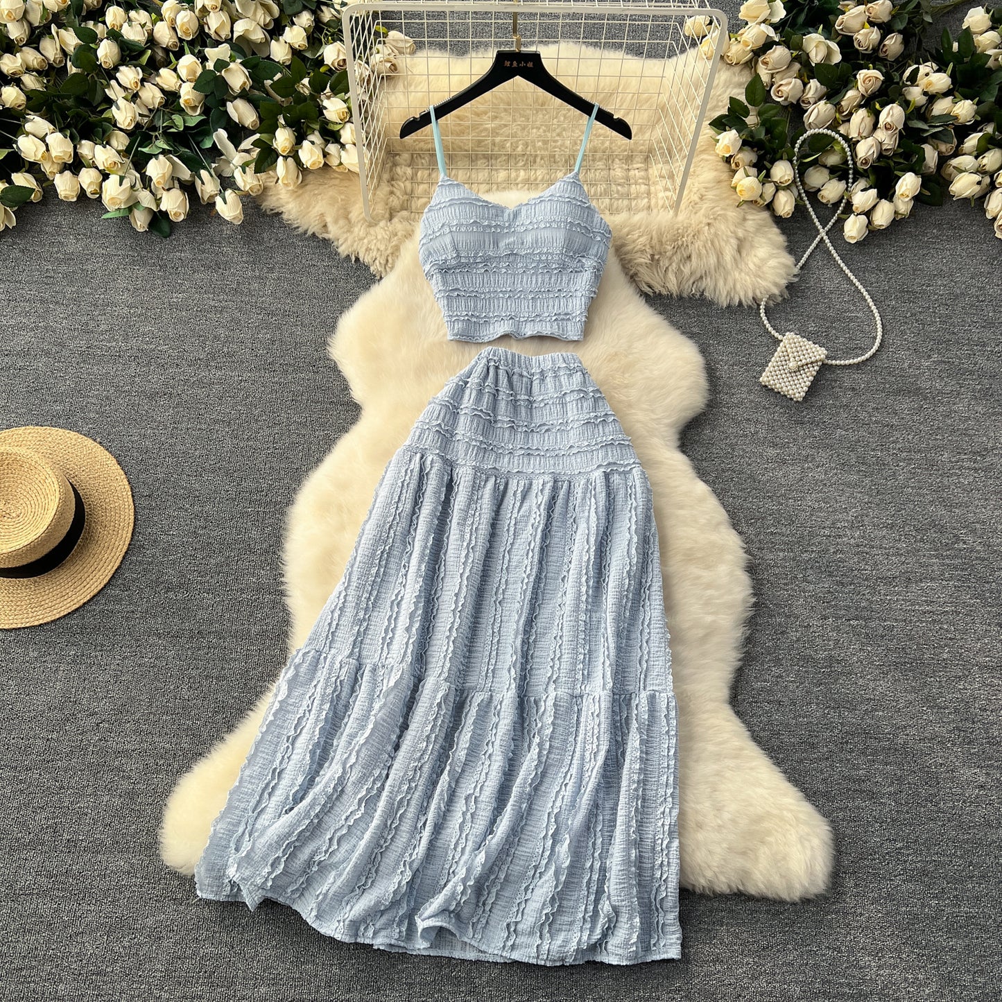 Age reduction suit women's summer wear 2023 new suspender top short versatile pendulum skirt sweet two-piece trendy set